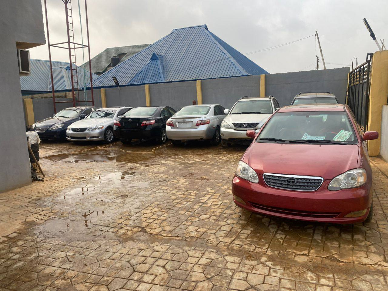 Cars parked inside the Olasheu Ara Autos dealership