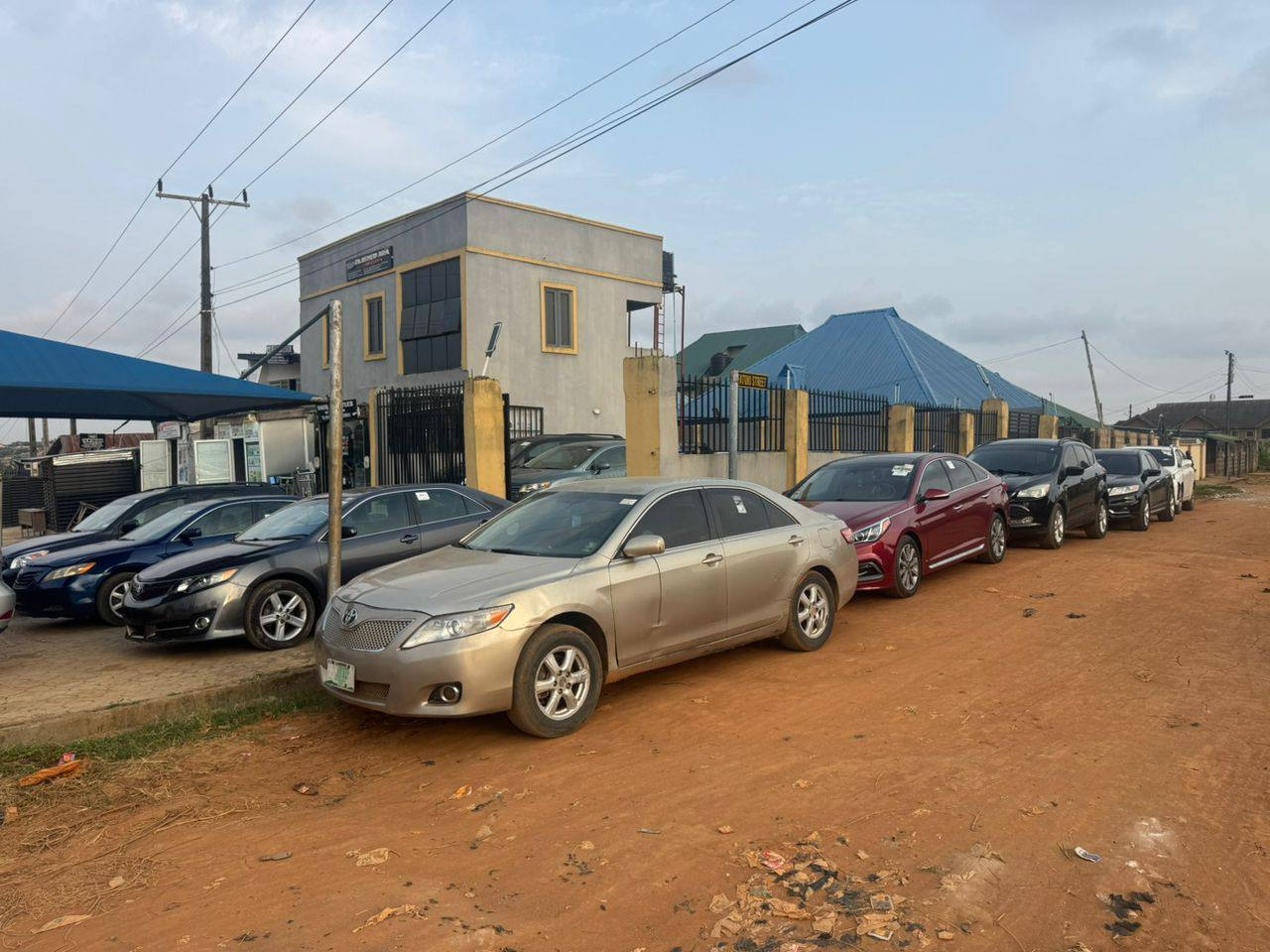 A line-up of cars available at Olasheu Ara Autos